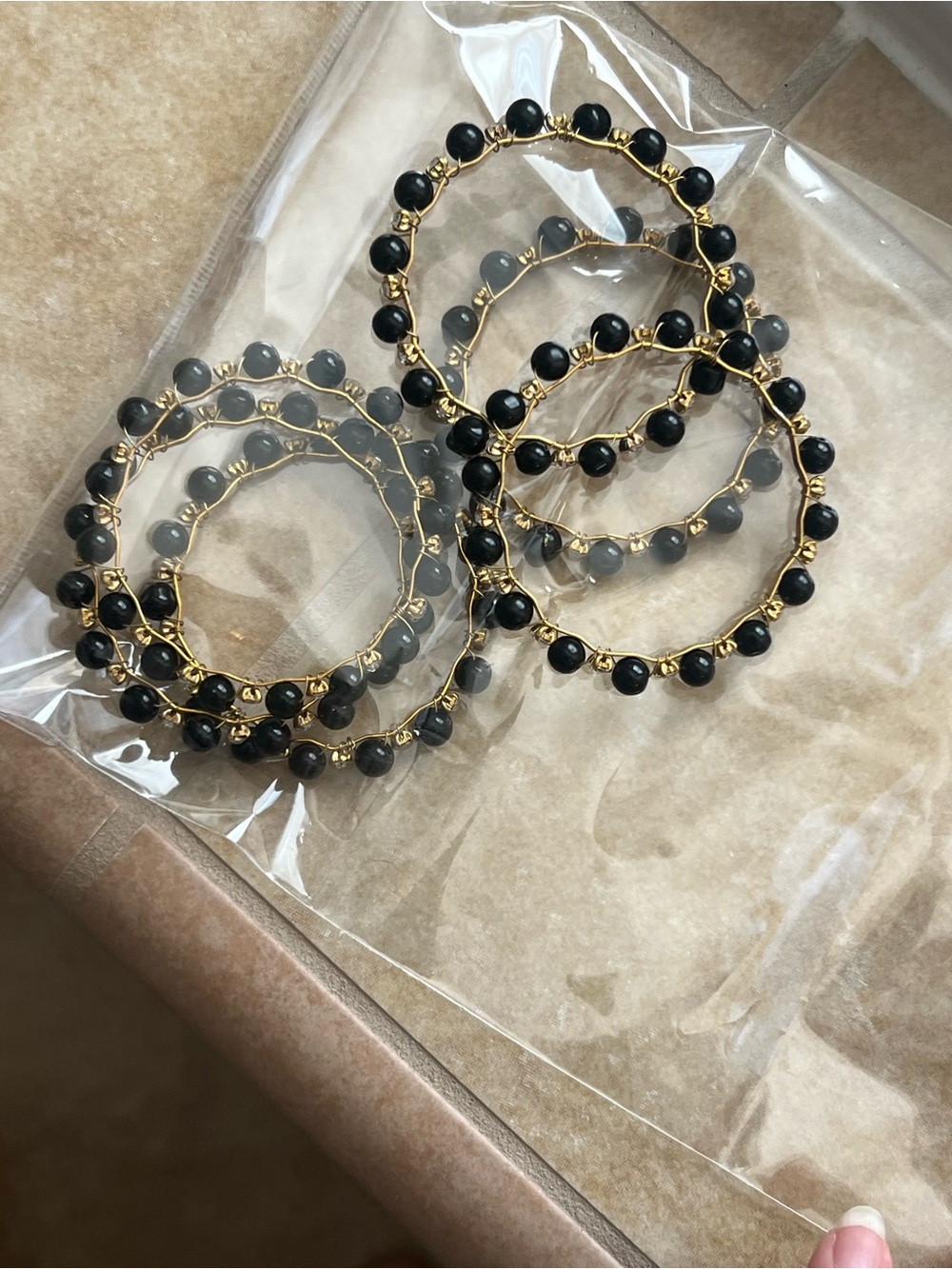 Gold and black bangles girls 4 years old